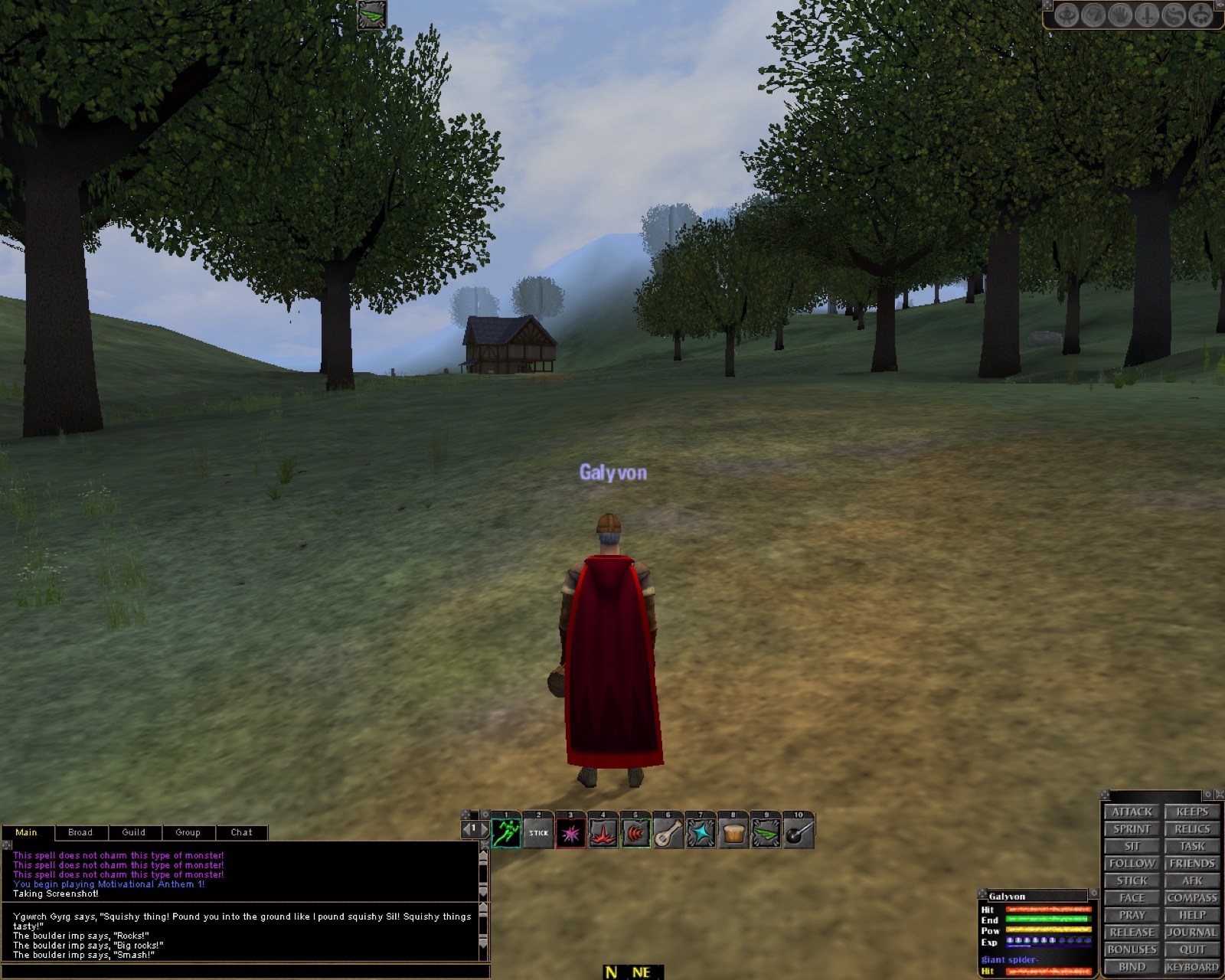 A red-caped figure stands on a misty wooded hill in Albion, a timber house behind him, with a lute on the quickbar and a giant spider in the pet window.